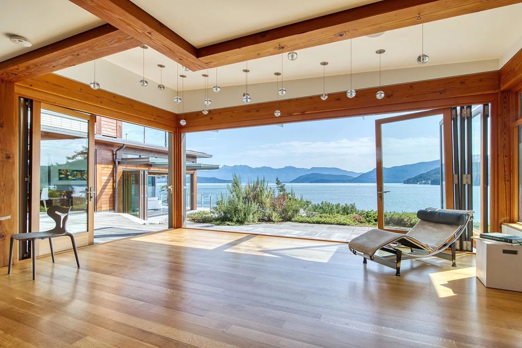 The Estate in Gibsons is a luxurious home offering exceptional privacy with a gorgeous mature landscaping and ocean views now available for sale. This home located at 1012 Marine Dr, Gibsons, BC V0N 1V1, Canada; offering 03 bedrooms and 04 bathrooms with 3,944 square feet of living spaces.