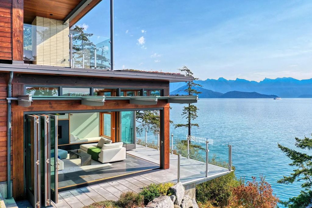 The Estate in Gibsons is a luxurious home offering exceptional privacy with a gorgeous mature landscaping and ocean views now available for sale. This home located at 1012 Marine Dr, Gibsons, BC V0N 1V1, Canada; offering 03 bedrooms and 04 bathrooms with 3,944 square feet of living spaces.