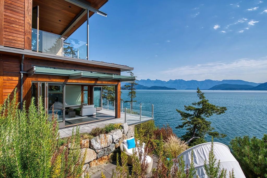 The Estate in Gibsons is a luxurious home offering exceptional privacy with a gorgeous mature landscaping and ocean views now available for sale. This home located at 1012 Marine Dr, Gibsons, BC V0N 1V1, Canada; offering 03 bedrooms and 04 bathrooms with 3,944 square feet of living spaces.