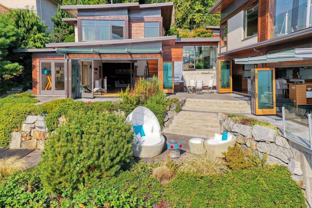 The Estate in Gibsons is a luxurious home offering exceptional privacy with a gorgeous mature landscaping and ocean views now available for sale. This home located at 1012 Marine Dr, Gibsons, BC V0N 1V1, Canada; offering 03 bedrooms and 04 bathrooms with 3,944 square feet of living spaces.