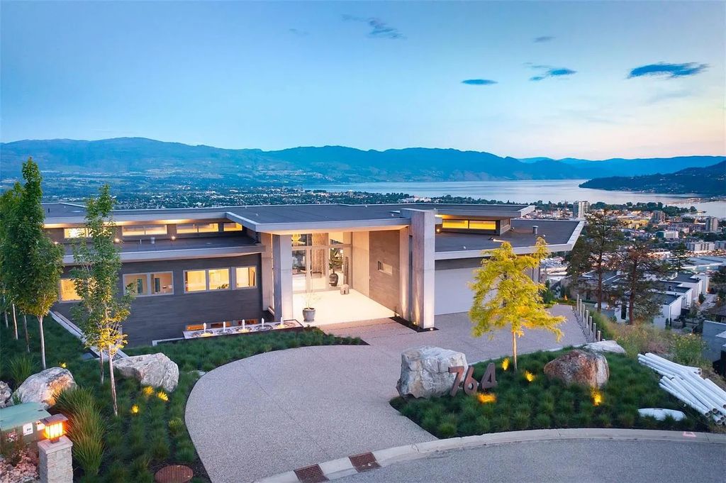 The House in Kelowna is a luxurious home with the unrivaled view to the city, lake, & valley, now available for sale. This home located at 764 Rockcliffe Pl, Kelowna, BC V1V 2Y3, Canada
