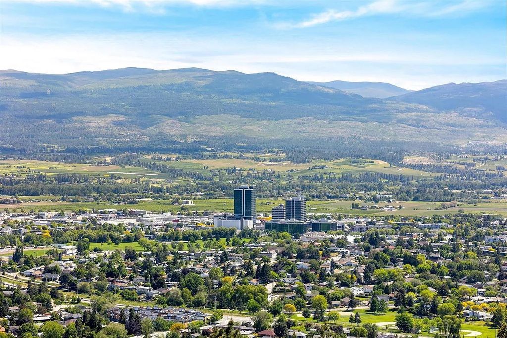 The House in Kelowna is a luxurious home with the unrivaled view to the city, lake, & valley, now available for sale. This home located at 764 Rockcliffe Pl, Kelowna, BC V1V 2Y3, Canada