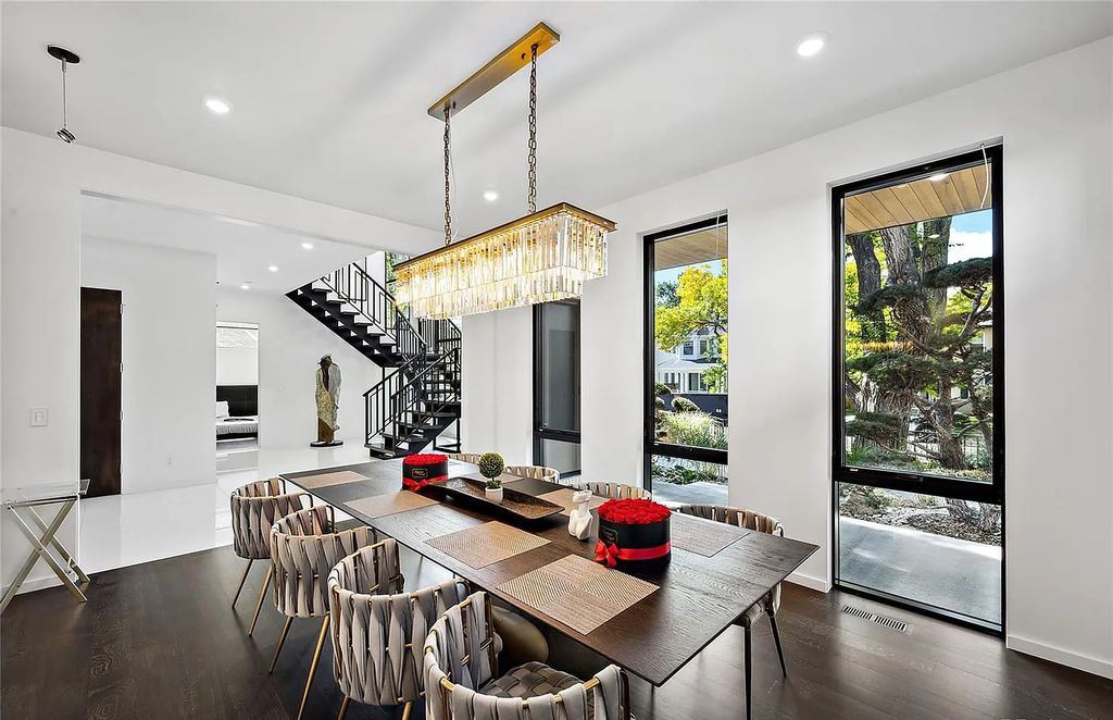 The Home in Denver, a refined modern luxury estate with many upgrades have been added inside and out including sparkling chandeliers, floating staircase and many other architectural details is now available for sale. This home located at 2464 S Adams Street, Denver, Colorado