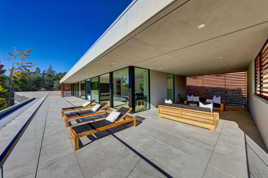 70 Ridgecrest Road, Kentfield, California is an architectural work of art on one of Marin County's most coveted sites with features include infinity edge pool, in ground spa, state of the art outdoor kitchen, fire pit, multiple lounging areas.