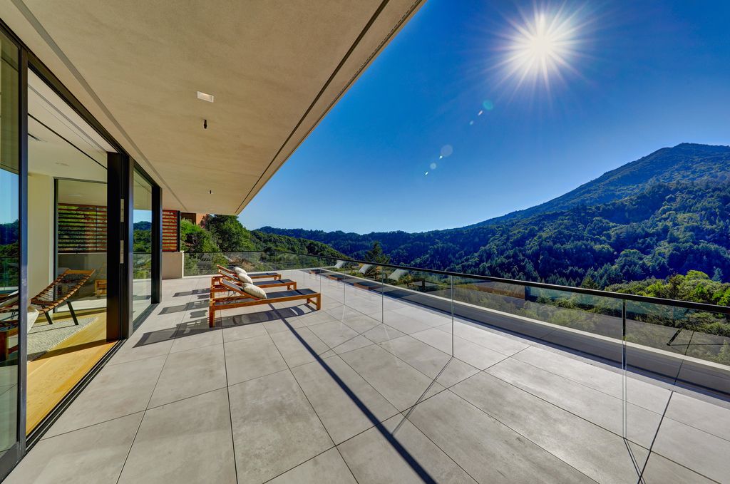 70 Ridgecrest Road, Kentfield, California is an architectural work of art on one of Marin County's most coveted sites with features include infinity edge pool, in ground spa, state of the art outdoor kitchen, fire pit, multiple lounging areas.