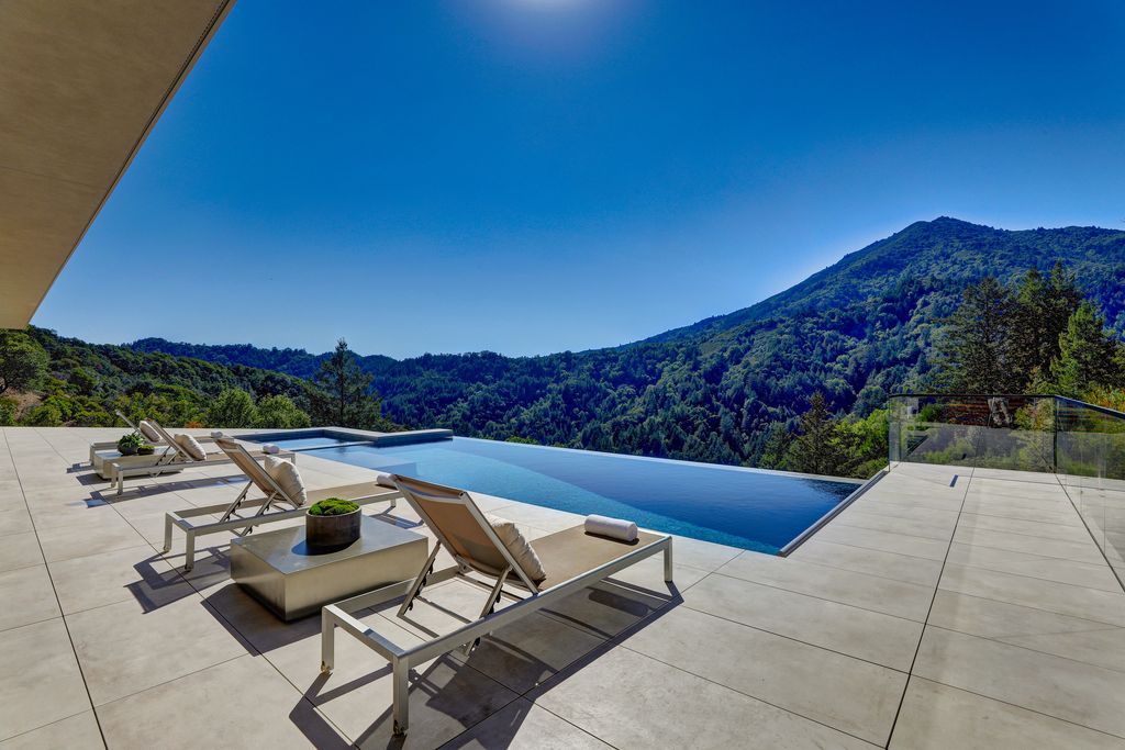 70 Ridgecrest Road, Kentfield, California is an architectural work of art on one of Marin County's most coveted sites with features include infinity edge pool, in ground spa, state of the art outdoor kitchen, fire pit, multiple lounging areas.