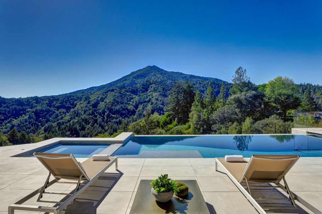 70 Ridgecrest Road, Kentfield, California is an architectural work of art on one of Marin County's most coveted sites with features include infinity edge pool, in ground spa, state of the art outdoor kitchen, fire pit, multiple lounging areas.