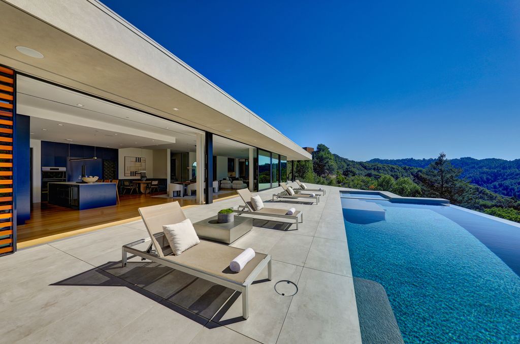 70 Ridgecrest Road, Kentfield, California is an architectural work of art on one of Marin County's most coveted sites with features include infinity edge pool, in ground spa, state of the art outdoor kitchen, fire pit, multiple lounging areas.