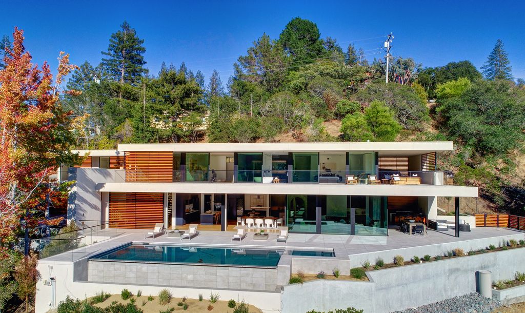 70 Ridgecrest Road, Kentfield, California is an architectural work of art on one of Marin County's most coveted sites with features include infinity edge pool, in ground spa, state of the art outdoor kitchen, fire pit, multiple lounging areas.