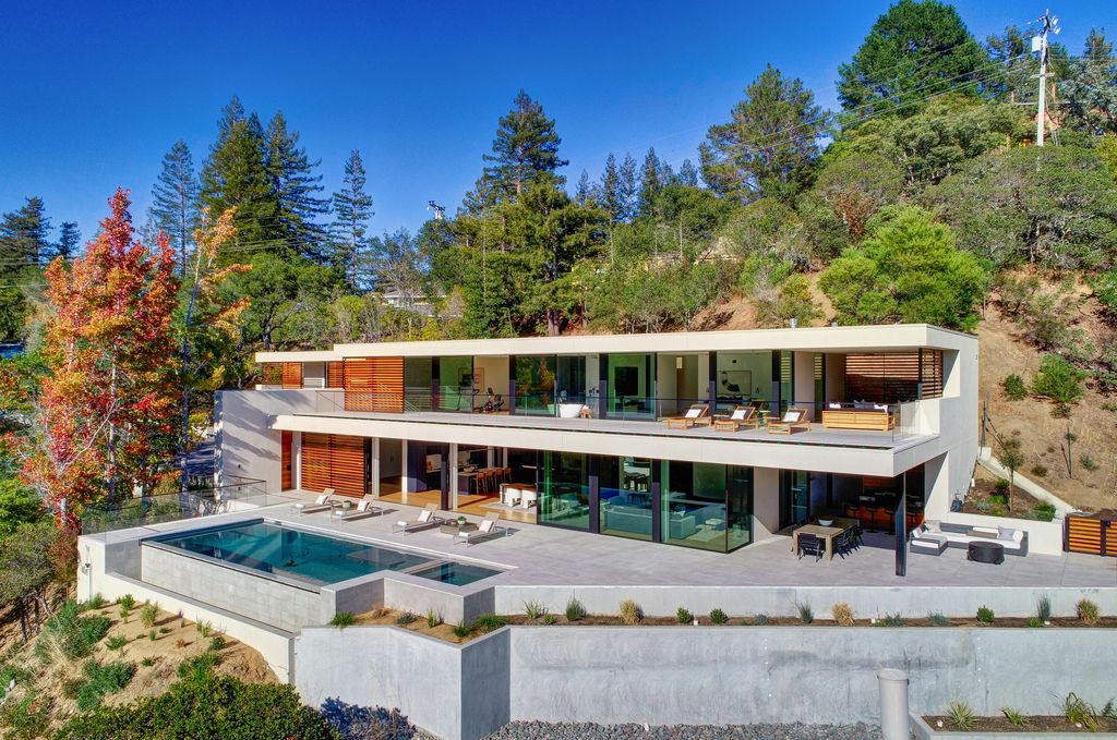 70 Ridgecrest Road, Kentfield, California is an architectural work of art on one of Marin County's most coveted sites with features include infinity edge pool, in ground spa, state of the art outdoor kitchen, fire pit, multiple lounging areas.