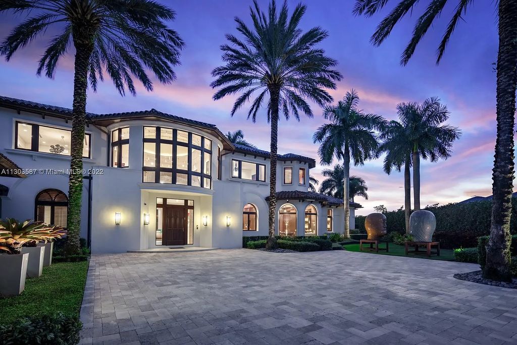 8808 Twin Lake Drive, Boca Raton, Florida is a classic Mediterranean waterfront estate with modern influences located in exclusive gated community of Long Lake Estates situated on 1.1 acres on the best cul-de-sac point lot with southern exposure and 300 ft of waterfrontage.