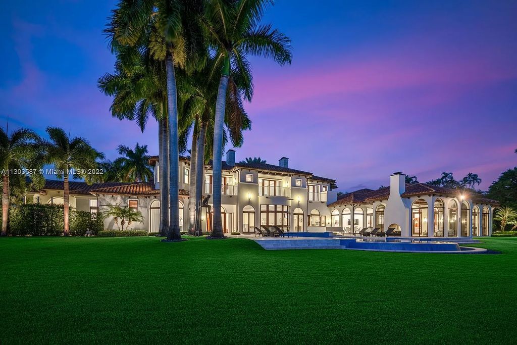 8808 Twin Lake Drive, Boca Raton, Florida is a classic Mediterranean waterfront estate with modern influences located in exclusive gated community of Long Lake Estates situated on 1.1 acres on the best cul-de-sac point lot with southern exposure and 300 ft of waterfrontage.