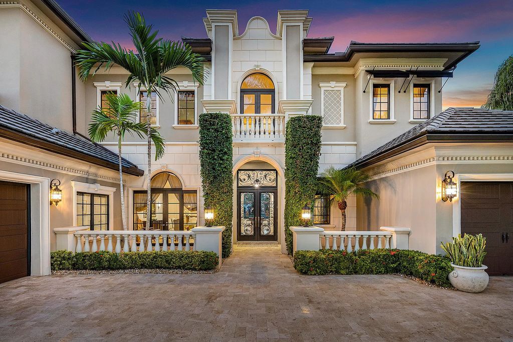 9179 Redonda Drive, Boca Raton, Florida is a custom lakefront Chateau in the prestigious Sanctuary section of The Oaks set on a special expansive lot with endless long lake views. 