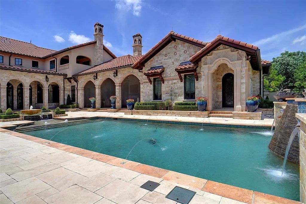 The Home in Colleyville, a Tuscan private gated estate which captivates fascinating ceilings, grand gallery walkways, Tuscan columns, exposed beams, intricately inlayed travertine, seamless glass curved bay windows, and stained glass encased windows is now available for sale. This home located at 5513 Montclair Dr, Colleyville, Texas