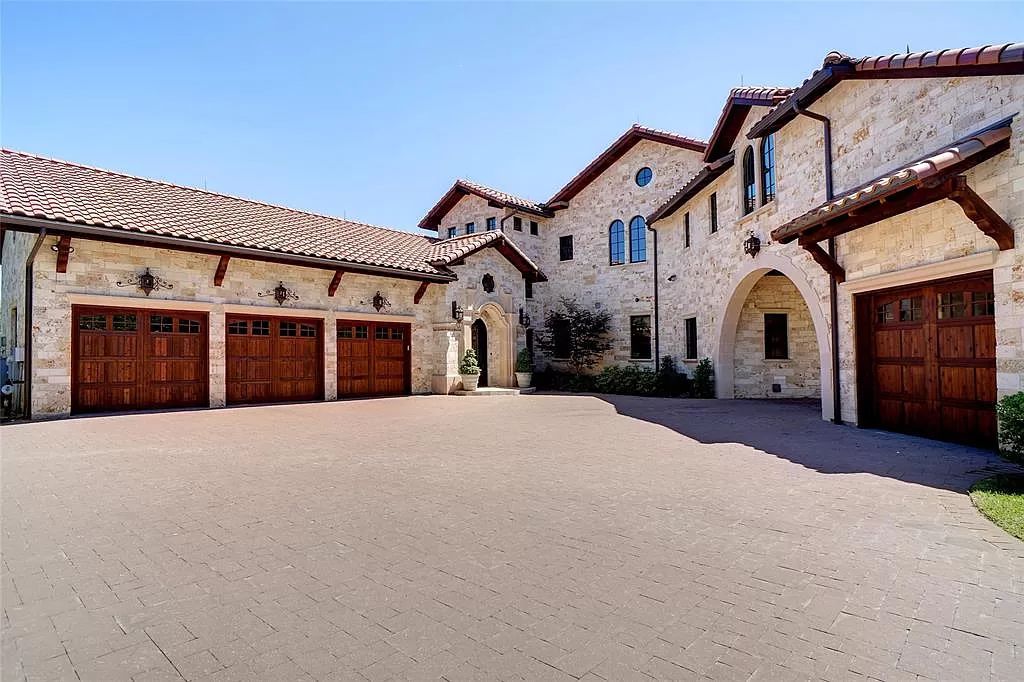 The Home in Colleyville, a Tuscan private gated estate which captivates fascinating ceilings, grand gallery walkways, Tuscan columns, exposed beams, intricately inlayed travertine, seamless glass curved bay windows, and stained glass encased windows is now available for sale. This home located at 5513 Montclair Dr, Colleyville, Texas