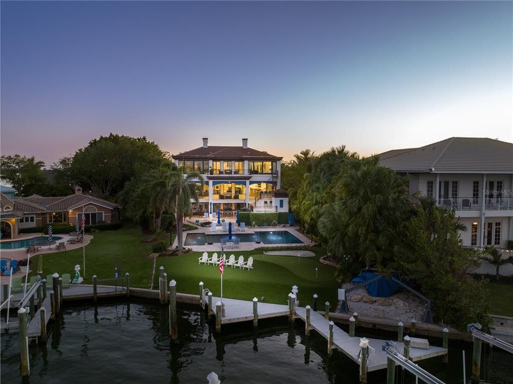 799 Freeling Drive, Sarasota, Florida is a one-of-a-kind estate situated on one of the most desirable streets on Bay Island at the north end of Siesta Key just minutes from the Gulf of Mexico with no fixed bridges.