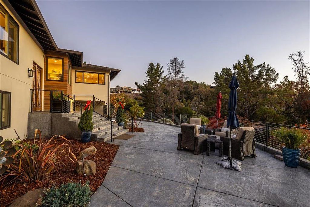 20901 Michaels Drive, Saratoga, California is a modern East facing home with divine sunrise views, city light night views sitting on a peaceful, quiet, location full of nature and still close to town; restaurants, parks, library, schools & more. 
