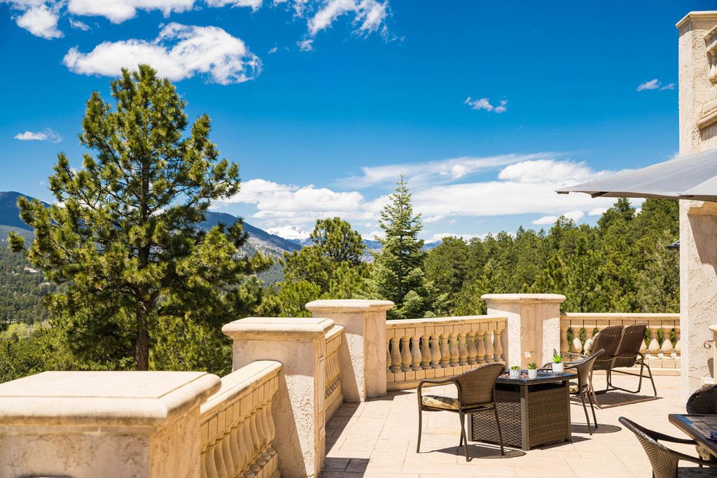 30726 Snowbird Lane, Evergreen, Colorado is a beautiful one-of-a-kind home sitting atop 9+ acres with breathtaking views close to world-class ski areas, as well as Denver’s major league sporting events and cultural activities. 