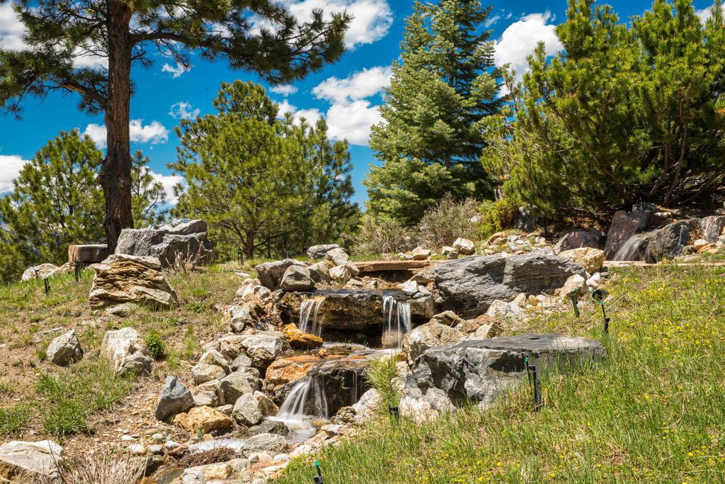 30726 Snowbird Lane, Evergreen, Colorado is a beautiful one-of-a-kind home sitting atop 9+ acres with breathtaking views close to world-class ski areas, as well as Denver’s major league sporting events and cultural activities. 