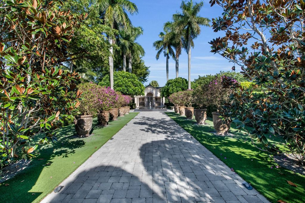 17791 Saxony Court, Boca Raton, Florida is an elegant home features all hurricane impact windows and doors, full-house generator, elevator, Control 4 smart home system, and much more.