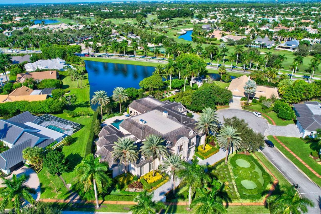 17791 Saxony Court, Boca Raton, Florida is an elegant home features all hurricane impact windows and doors, full-house generator, elevator, Control 4 smart home system, and much more.