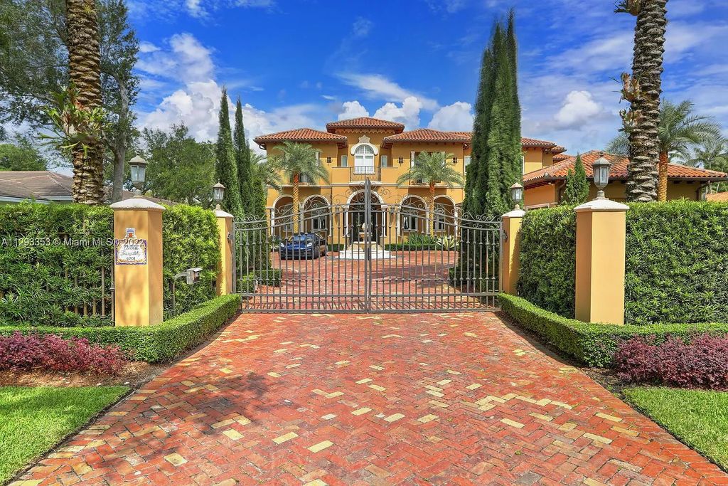 6701 SW 72nd Court, Miami, Florida is a Mediterranean Masterpiece with private electronic gates boasts top-of-the-line finishes and professionally designed landscaping perfect for entertaining.