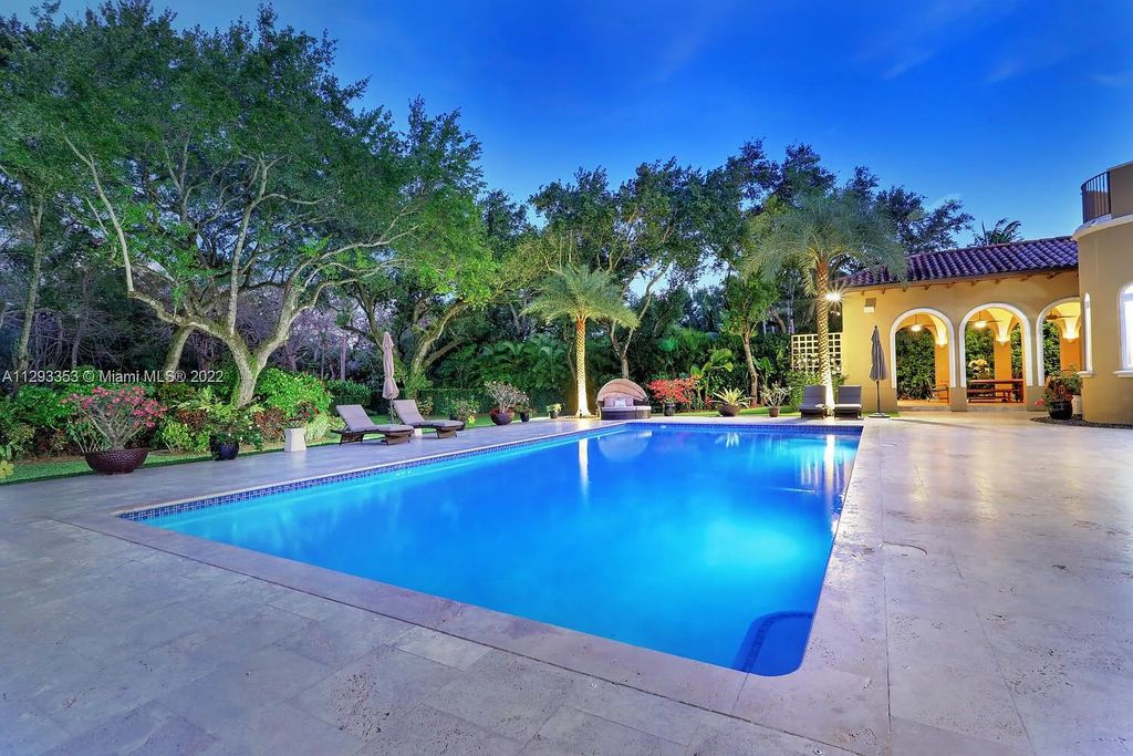 6701 SW 72nd Court, Miami, Florida is a Mediterranean Masterpiece with private electronic gates boasts top-of-the-line finishes and professionally designed landscaping perfect for entertaining.