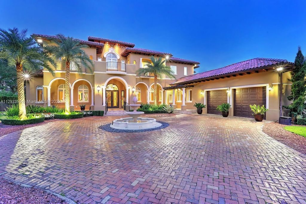 6701 SW 72nd Court, Miami, Florida is a Mediterranean Masterpiece with private electronic gates boasts top-of-the-line finishes and professionally designed landscaping perfect for entertaining.