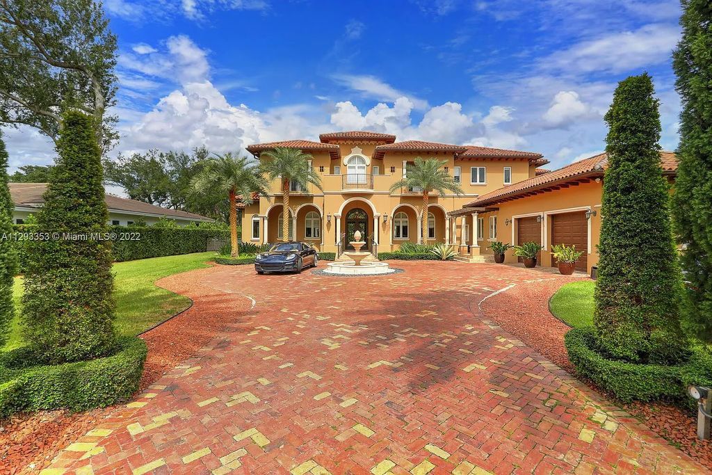 6701 SW 72nd Court, Miami, Florida is a Mediterranean Masterpiece with private electronic gates boasts top-of-the-line finishes and professionally designed landscaping perfect for entertaining.