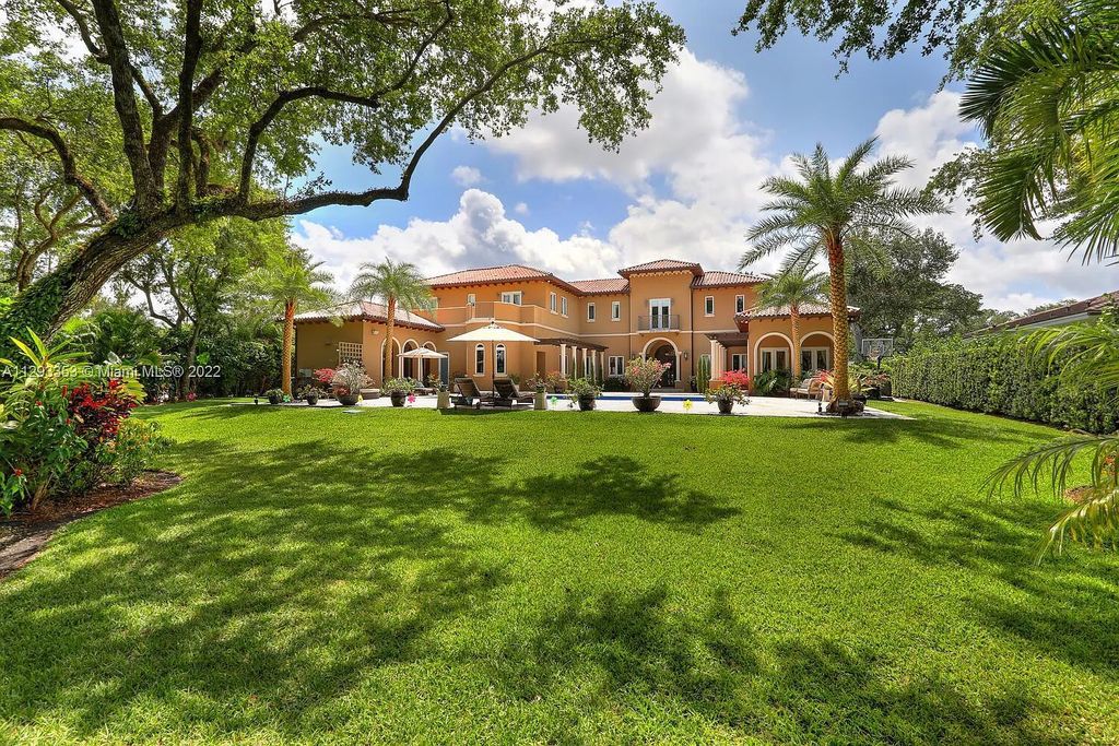 6701 SW 72nd Court, Miami, Florida is a Mediterranean Masterpiece with private electronic gates boasts top-of-the-line finishes and professionally designed landscaping perfect for entertaining.