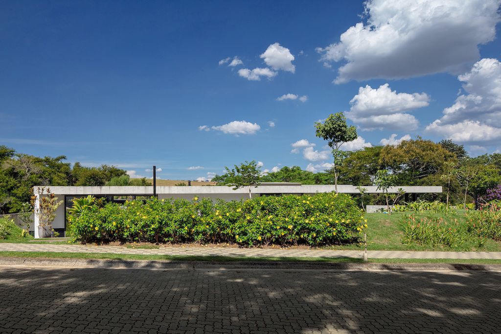 A3L House with Outside Living Connection Design by Obra Arquitetos