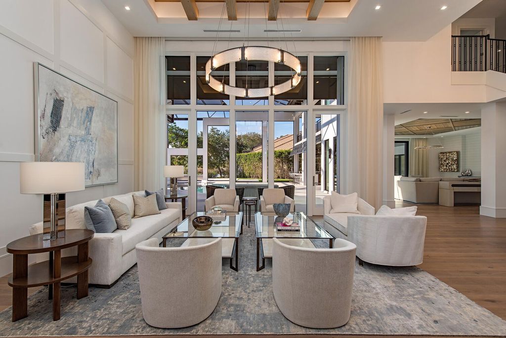 331 Colony Drive, Naples, Florida is an architectural masterpiece was rebuilt by BCB Homes with the absolute finest specifications, long lake views, impeccable interior, incredible furnishings, and creative finishes.