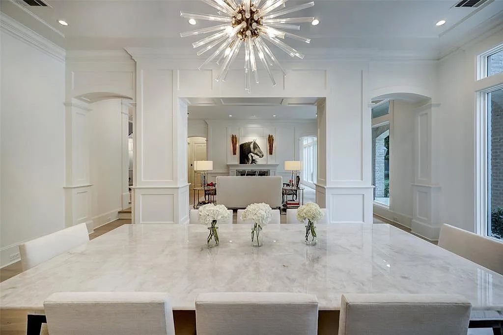 11526 Shadow Way Street, Houston, Texas is an exceptional gated property with spectacular living areas and dining room overlook to serene setting and pool, sophisticated interiors featuring a series of luminous open spaces. 