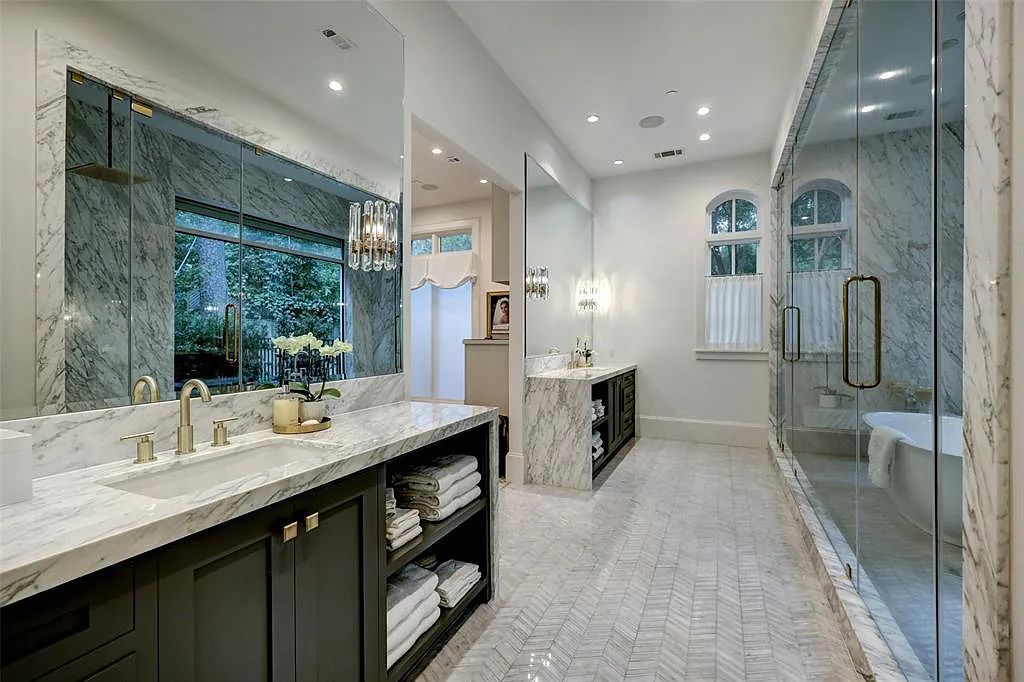 11526 Shadow Way Street, Houston, Texas is an exceptional gated property with spectacular living areas and dining room overlook to serene setting and pool, sophisticated interiors featuring a series of luminous open spaces. 