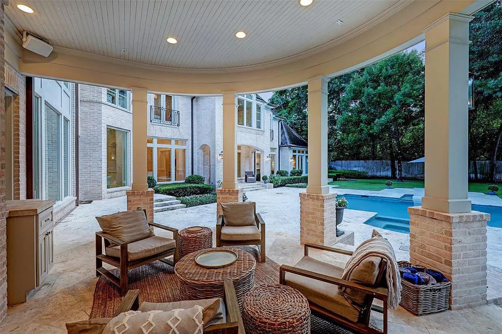 11526 Shadow Way Street, Houston, Texas is an exceptional gated property with spectacular living areas and dining room overlook to serene setting and pool, sophisticated interiors featuring a series of luminous open spaces. 