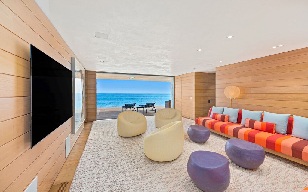 28034 Sea Lane Drive, Malibu, California is a modern estate designed by architect William Hefner and interiors designed by Billy Cotton embraces the Malibu lifestyle in a gated community on a private road.