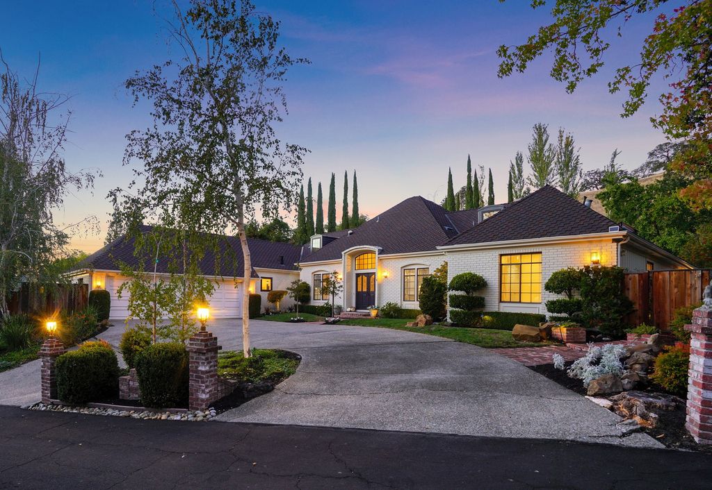 1941 Parkmont Drive, Alamo, California is beautiful remodeled custom home features a resort-like backyard with pool, spa, outdoor kitchen, built-in fire pit, bocce court, expansive level grassy area to play, sport court location, producing vineyard, vegetable garden beds, & fruit trees.