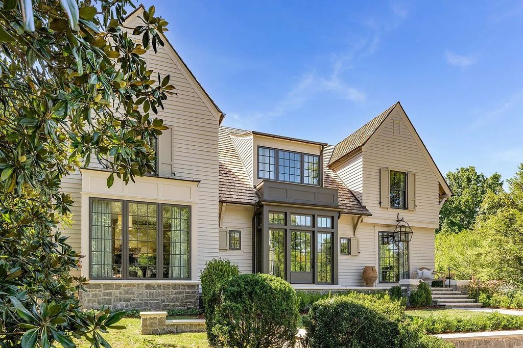 The Home in Nashville supplies the plunge pool/spa with a calming water feature & privacy landscaped & fenced backyard, now available for sale. This home located at 325 Walnut Dr, Nashville, Tennessee