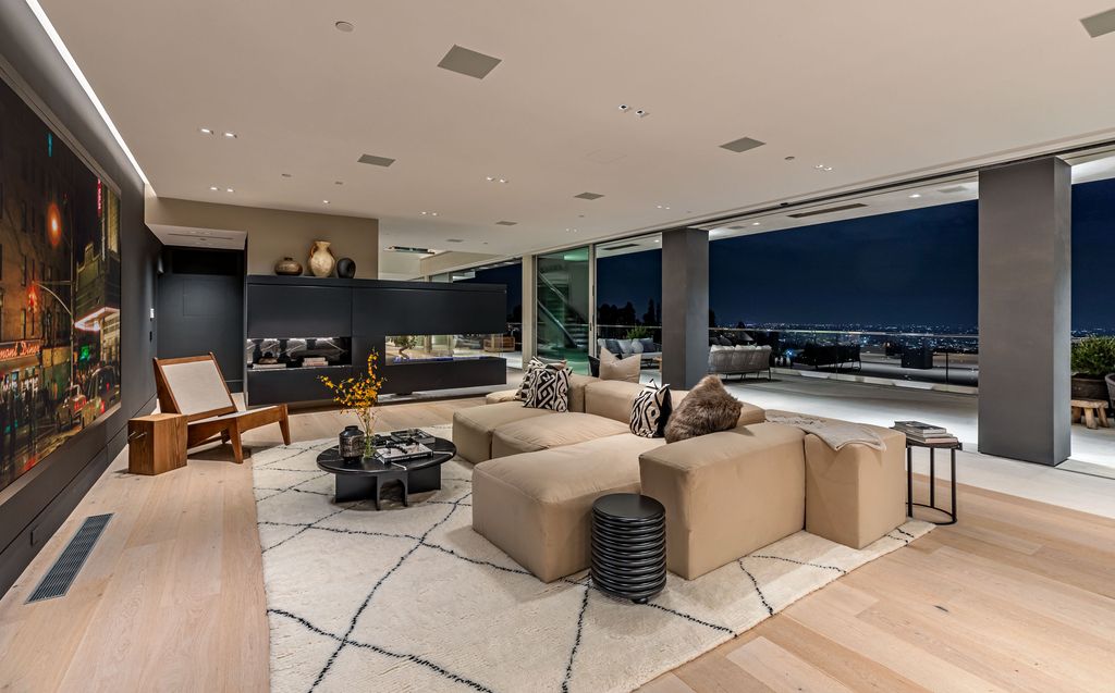 1250 Bel Air Road, Los Angeles, California is an one of a kind estate sited on over 5.5 acres jetliner views lot boasts features including a museum quality garage with panoramic views, vast entertaining spaces with automated walls of glass that open to expansive terraces.