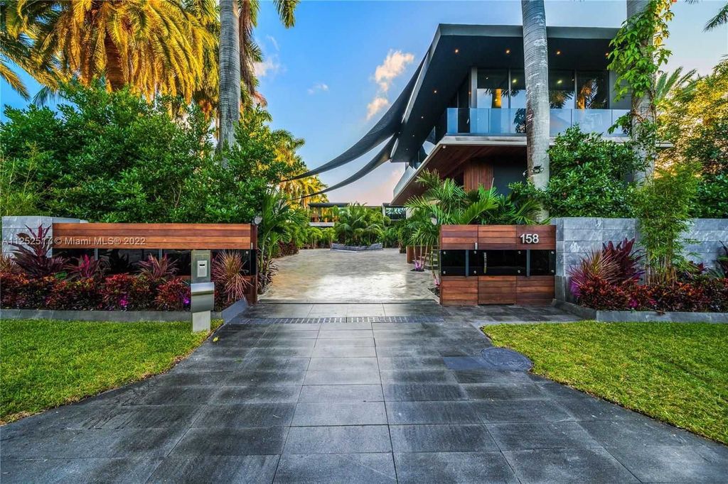 158 Palm Avenue, Miami Beach, Florida is a new construction masterpiece in one of the most coveted Miami Beach gated communities with 100' water frontage, stunning bay and skyline views.