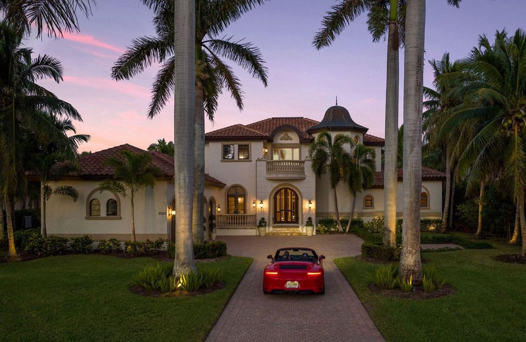 2539 Escada Court, Naples, Florida is a custom-built estate just minutes to world class beaches, shopping and fine dining with picturesque pool and lake views from just about every room.