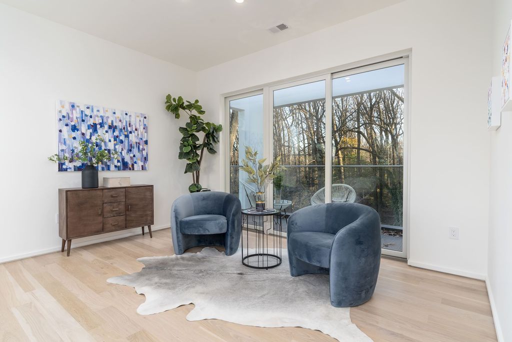 The House in Arlington boasts dual walk-in closets, an outdoor seating area and an owner's bath with a European spa-quality shower, now available for sale. This home located at 4620 26th St N, Arlington, Virginia