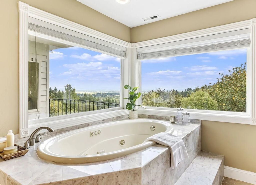 The Estate in Portland is a luxurious home commanding breathtaking panoramic views of 3 mountains now available for sale. This home located at 17010 NW Sheltered Nook Rd, Portland, Oregon; offering 06 bedrooms and 06 bathrooms with 7,719 square feet of living spaces.