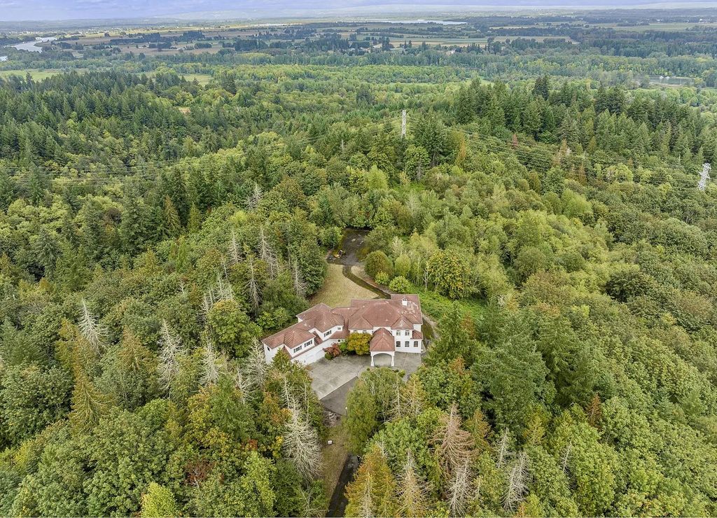The Estate in Portland is a luxurious home commanding breathtaking panoramic views of 3 mountains now available for sale. This home located at 17010 NW Sheltered Nook Rd, Portland, Oregon; offering 06 bedrooms and 06 bathrooms with 7,719 square feet of living spaces.