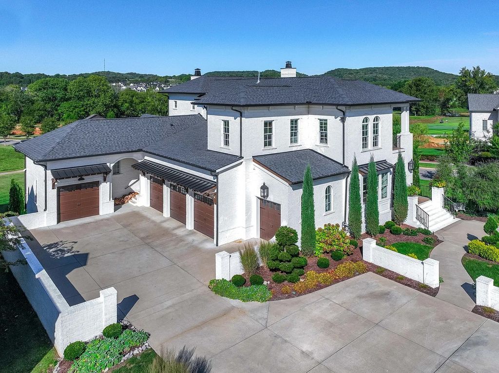 The Home in College Grove is a luxurious home with mature landscaped grounds and extensive landscape lighting, now available for sale. This home located at 8601 Shortleaf Ct, College Grove, Tennessee