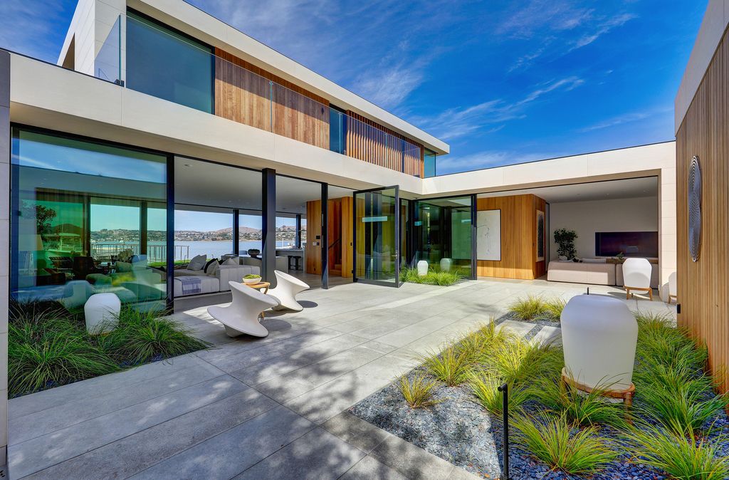 The Home in Belvedere, a waterfront contemporary masterpiece designed by the incomparable architectural firm of Butler Armsden completing with no expense spared in the entitlement, design, and construction is now available for sale. This home located at 9 W Shore Rd, Belvedere, California