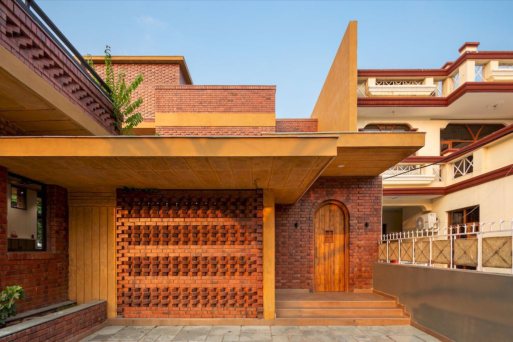 Ishtika Aalaya Residence, Chic Brick House by Studio Built Environment