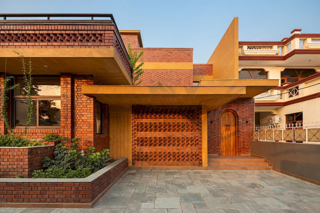 Ishtika Aalaya Residence, Chic Brick House by Studio Built Environment