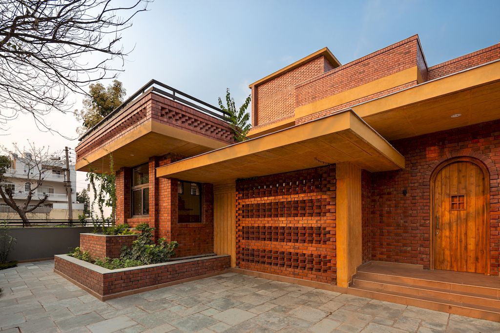 Ishtika Aalaya Residence, Chic Brick House by Studio Built Environment