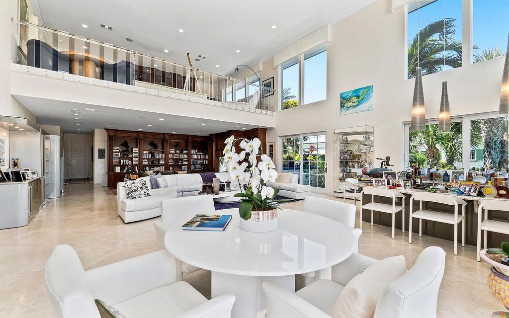6819 SE South Marina Way, Stuart, Florida is a dream property in a guard gated oceanfront community Sailfish Point with dockage to accommodate an 80ft yacht and just minutes to the inlet and ocean.